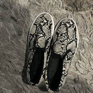 Snake print slip ons